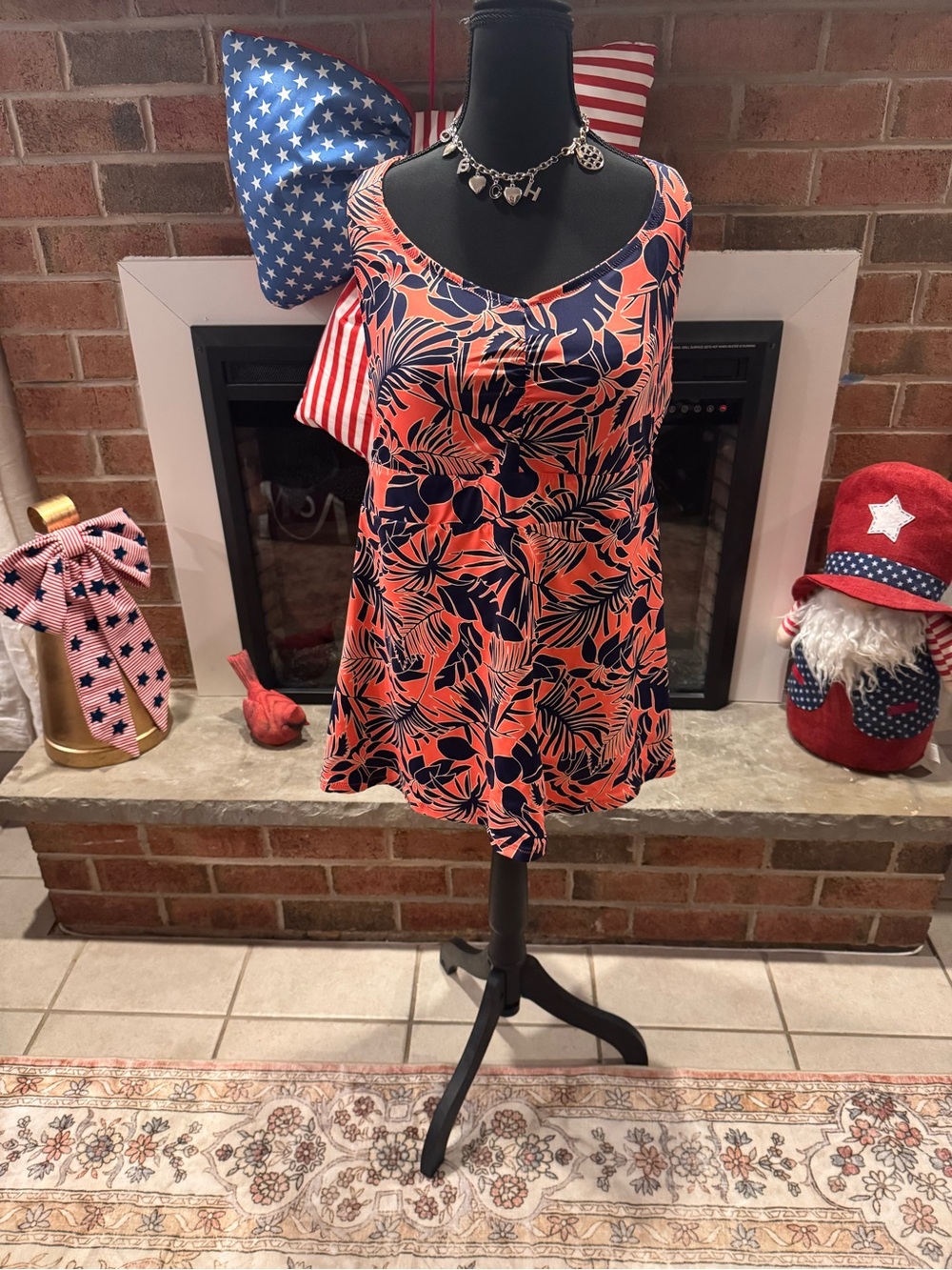 Old Navy Coral and Black Leaf Print Swim  top.